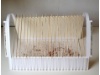 Laboratorium,Objekt,Passepartoutkarton, Holzstäbe, Reagenzgläser, Linoldruck, Grafit, 2021, 28 x 50 x 29 cm Laboratorium vorne